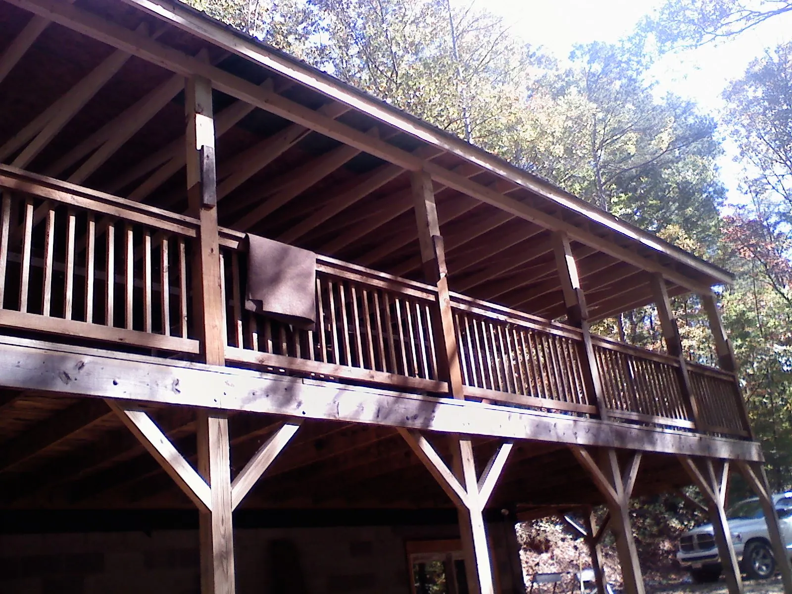 Timber framing under a new elevated porch and deck — Roof Leak Repair in La Junta by Roofing Brothers